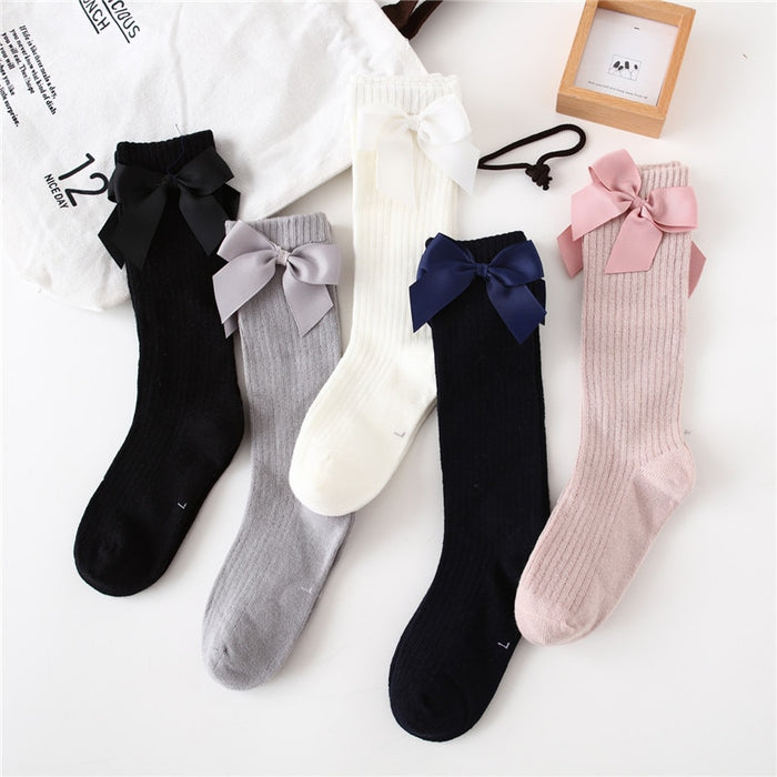 Seasonal Elegance: Delicate Bow Adorned Knee High Socks for Girls